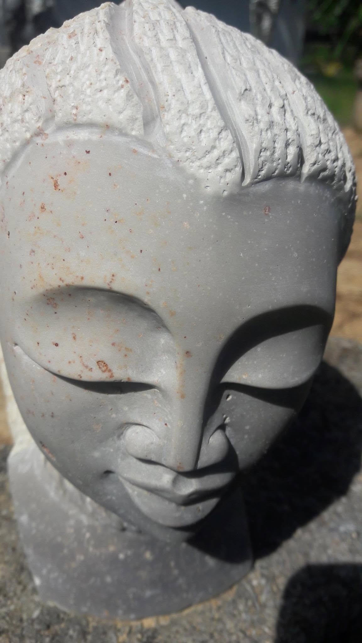 Carved Stone Woman Bust
